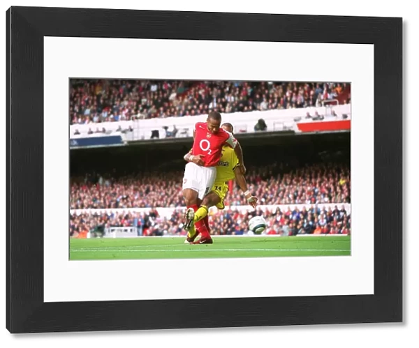 Thierry Henry scores his 1st goal (Arsenals 2nd) under pressure from Jonathan Fortune