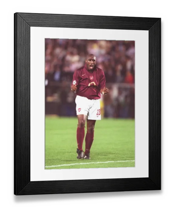 Framed Print : Sol Campbell's Euphoric Celebration: Arsenal's Dramatic 0-0 Draw in the UEFA Cup Semifinal vs. Villarreal