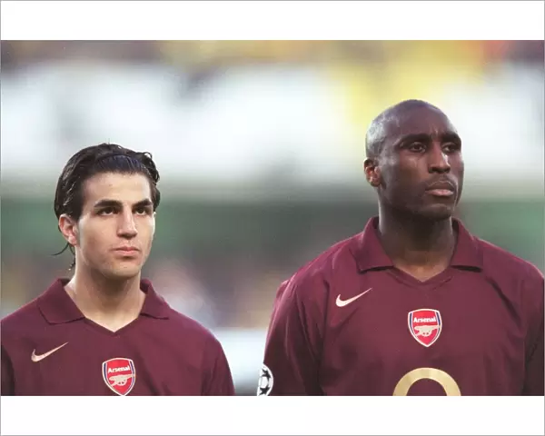 Cesc Fabrega and Sol Campbell (Arsenal) line up before the match