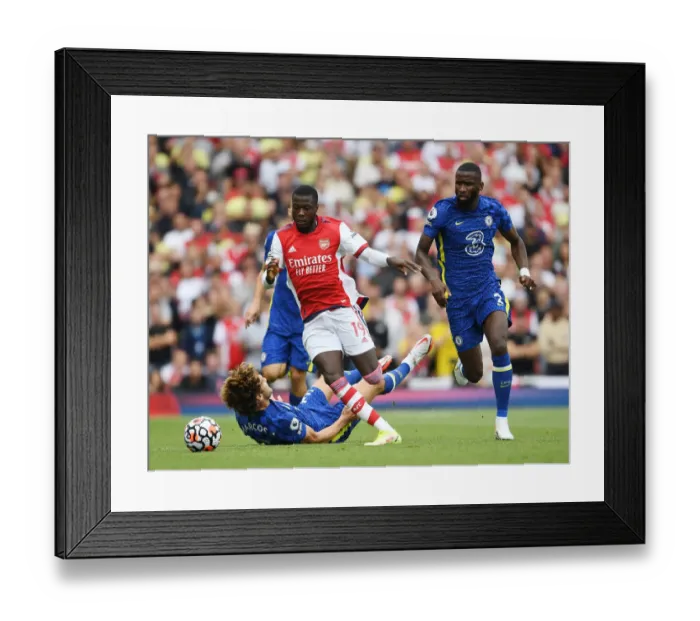 Framed Print : Pepe's Sneaky Moves: Outwitting Alonso in the Arsenal vs. Chelsea Showdown