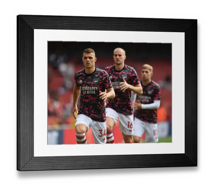 Framed Print : Granit Xhaka: Arsenal's Battle-Ready Midfielder Gears Up for Premier League Clash Against Chelsea