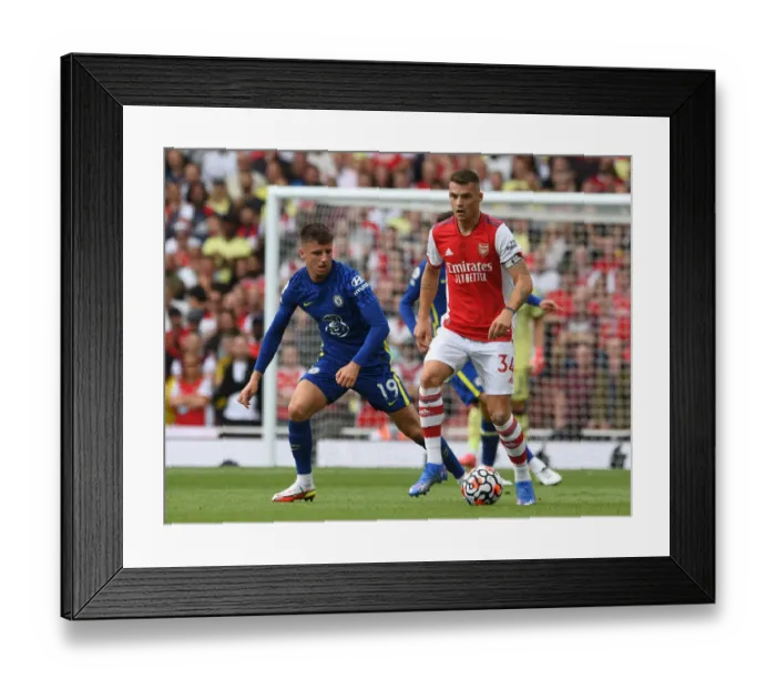 Framed Print : Xhaka vs. Mount: Midfield Showdown in Arsenal vs. Chelsea Premier League Clash Framed Print : Xhaka vs. Mount: Midfield Showdown in Arsenal vs. Chelsea Premier League Clash