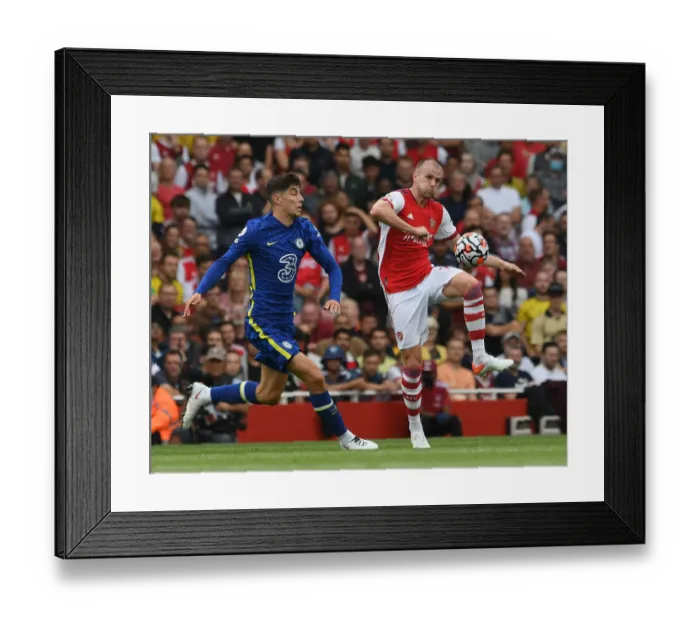 Framed Print : Arsenal vs. Chelsea: Rob Holding Faces Off Against Kai Havertz in Intense Premier League Clash