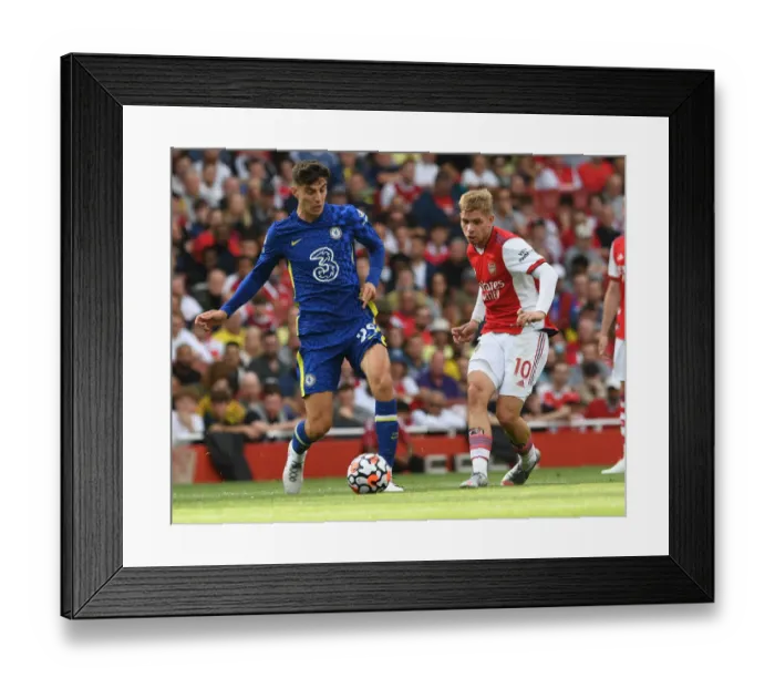 Framed Print : Arsenal vs. Chelsea: Emile Smith Rowe Fends Off Kai Havertz Pressure in Premier League Clash Framed Print : Arsenal vs. Chelsea: Emile Smith Rowe Fends Off Kai Havertz Pressure in Premier League Clash