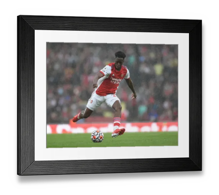 Framed Print : Arsenal's Albert Sambi Lokonga Goes Head-to-Head Against Chelsea in the 2021-22 Premier League