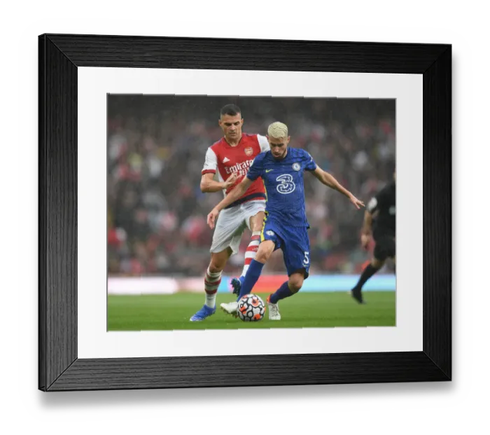 Framed Print : Clash of Midfield Titans: Arsenal's Xhaka vs. Chelsea's Jorginho in the Premier League Showdown Framed Print : Clash of Midfield Titans: Arsenal's Xhaka vs. Chelsea's Jorginho in the Premier League Showdown