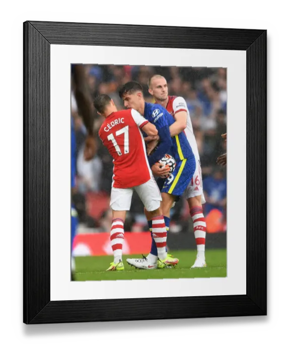 Framed Print : Arsenal vs. Chelsea: Intense Battle for Ball Possession - Arsenal's Holding and Soares vs. Chelsea's Havertz (Premier League 2021-22) Framed Print : Arsenal vs. Chelsea: Intense Battle for Ball Possession - Arsenal's Holding and Soares vs. Chelsea's Havertz (Premier League 2021-22)