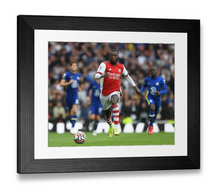 Framed Print : Pepe vs Chelsea Showdown: 2021-22 Premier League Clash at Emirates Stadium Framed Print : Pepe vs Chelsea Showdown: 2021-22 Premier League Clash at Emirates Stadium