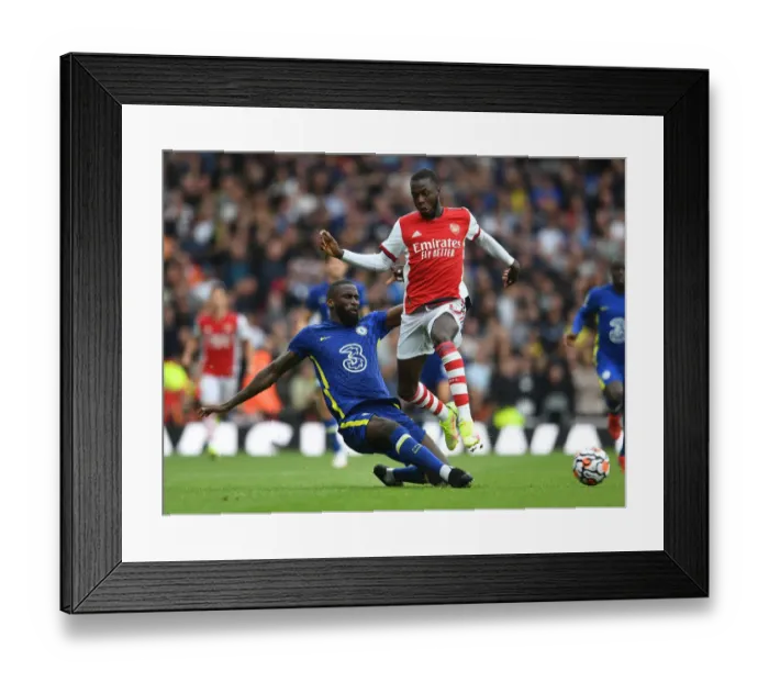 Framed Print : Arsenal vs. Chelsea: Pepe vs. Rudiger - Premier League Clash at Emirates Stadium Framed Print : Arsenal vs. Chelsea: Pepe vs. Rudiger - Premier League Clash at Emirates Stadium