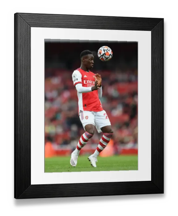 Framed Print : Arsenal's Flo Balogun Fights for Possession Against Chelsea in Premier League 2021-22 Framed Print : Arsenal's Flo Balogun Fights for Possession Against Chelsea in Premier League 2021-22
