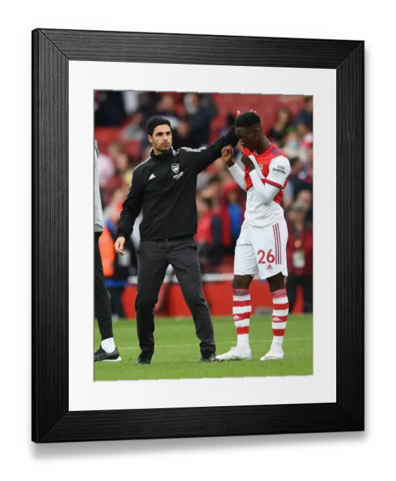 Framed Print : Arsenal Manager Mikel Arteta Celebrates with Flo Balogun after Arsenal vs. Chelsea Win
