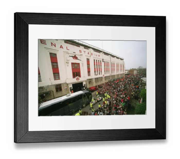 Framed Print : The Arsenal Team coach drops the players at the East Stand on Avenell Road