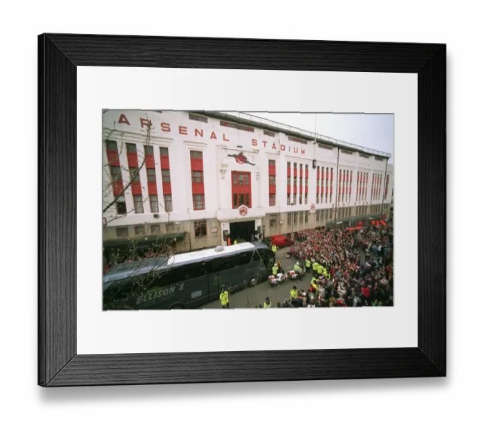 Framed Print : The Arsenal coach arrives outside the East Stand