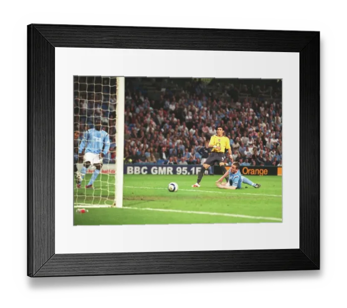 Framed Print : Jose Reyes scores Arsenals 2nd goal his 1st under pressure from Richard Dunne Framed Print : Jose Reyes scores Arsenals 2nd goal his 1st under pressure from Richard Dunne