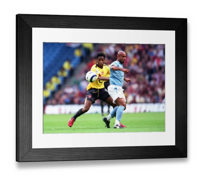 Framed Print : Alex Song (Arsenal) Trevor Sinclair (Man City). Manchester City 1: 3 Arsenal Framed Print : Alex Song (Arsenal) Trevor Sinclair (Man City). Manchester City 1: 3 Arsenal