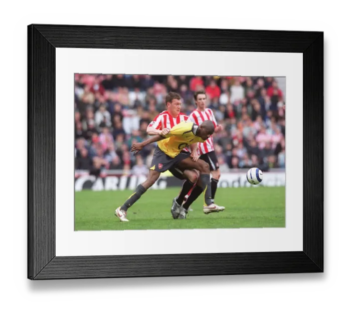Framed Print : Abou Diaby (Arsenal) Kevin Kyle (Sunderland) Framed Print : Abou Diaby (Arsenal) Kevin Kyle (Sunderland)