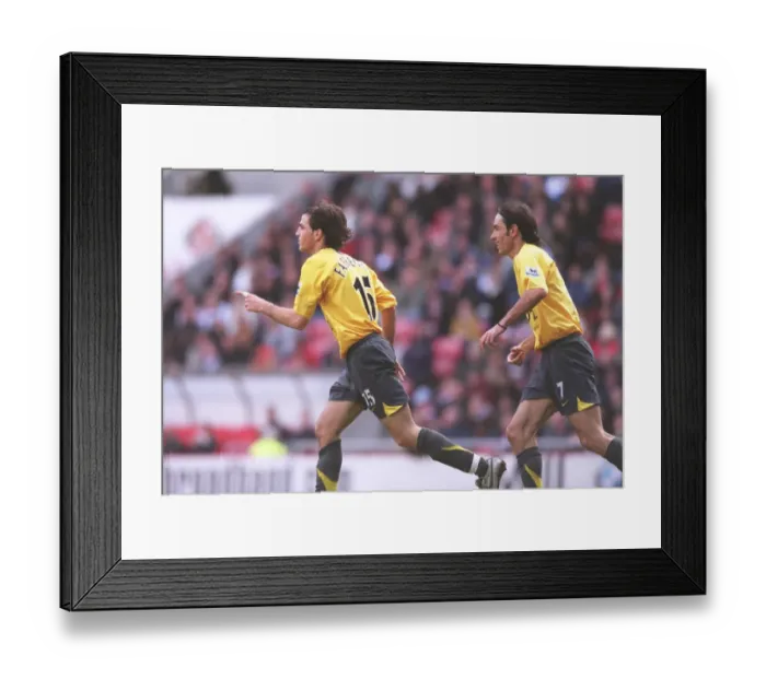 Framed Print : Fabregas and Pires: Unstoppable Duo Celebrates Arsenal's Dominance over Sunderland (2006) Framed Print : Fabregas and Pires: Unstoppable Duo Celebrates Arsenal's Dominance over Sunderland (2006)