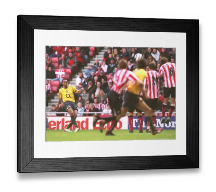 Framed Print : Theirry Henry shoots past Sunderland goalkeeper Kelvin Davis to score the 3rd Arsenal goal from a fr Framed Print : Theirry Henry shoots past Sunderland goalkeeper Kelvin Davis to score the 3rd Arsenal goal from a fr