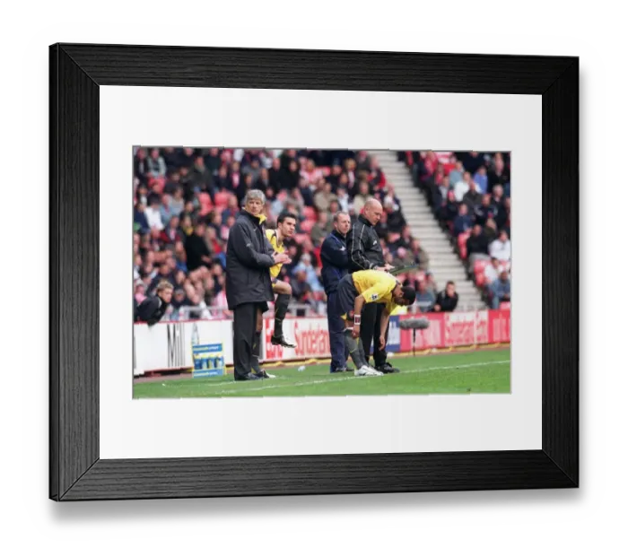 Framed Print : Arsene Wenger the Arsenal Manager brings on substitutes Ashley Cole and Robin van Persie Framed Print : Arsene Wenger the Arsenal Manager brings on substitutes Ashley Cole and Robin van Persie