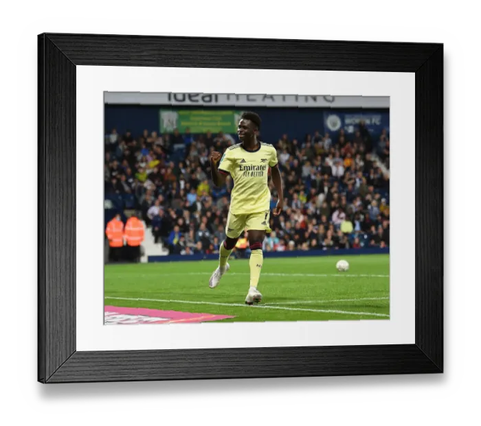 Framed Print : Bukayo Saka Scores the Decisive Goal: Arsenal Wins Carabao Cup against West Bromwich Albion