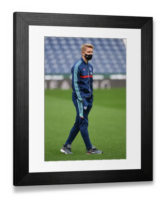 Framed Print : Arsenal's Martin Odegaard Prepares for Carabao Cup Clash against West Bromwich Albion Framed Print : Arsenal's Martin Odegaard Prepares for Carabao Cup Clash against West Bromwich Albion