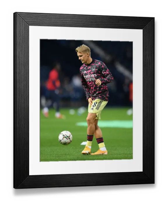 Framed Print : Martin Odegaard Gears Up: Arsenal's Carabao Cup Battle against West Bromwich Albion