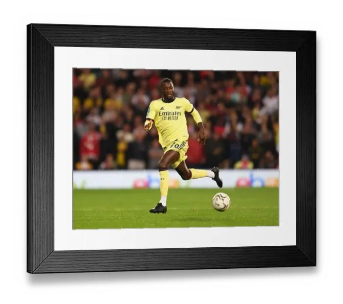 Framed Print : Nicolas Pepe in Action: Arsenal Overpowers West Bromwich Albion in Carabao Cup Clash Framed Print : Nicolas Pepe in Action: Arsenal Overpowers West Bromwich Albion in Carabao Cup Clash