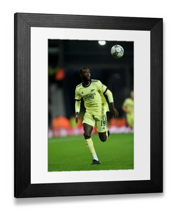 Framed Print : Arsenal's Nicolas Pepe in Action against West Bromwich Albion in Carabao Cup Match Framed Print : Arsenal's Nicolas Pepe in Action against West Bromwich Albion in Carabao Cup Match
