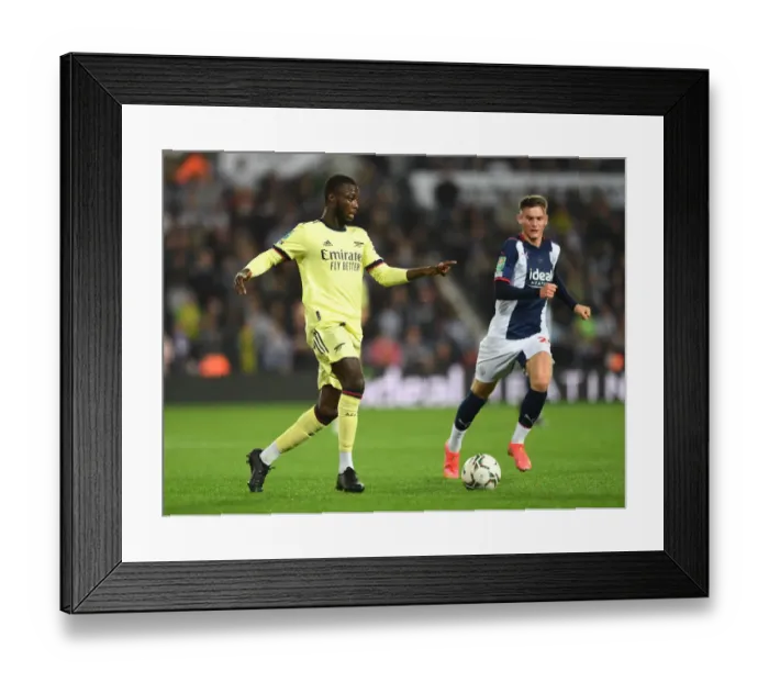 Framed Print : Nicolas Pepe in Action: Arsenal's Star Forward Shines in Carabao Cup Clash vs. West Bromwich Albion