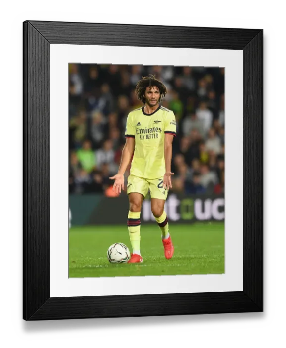 Framed Print : Arsenal's Mohamed Elneny in Action against West Bromwich Albion in Carabao Cup Clash