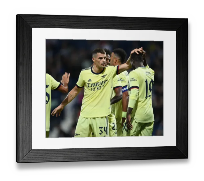 Framed Print : Arsenal's Granit Xhaka and Nicolas Pepe Celebrate Goals in Carabao Cup Win Against West Bromwich Albion