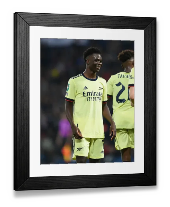 Framed Print : Bukayo Saka in Action: Arsenal vs. West Bromwich Albion, Carabao Cup 2021-22