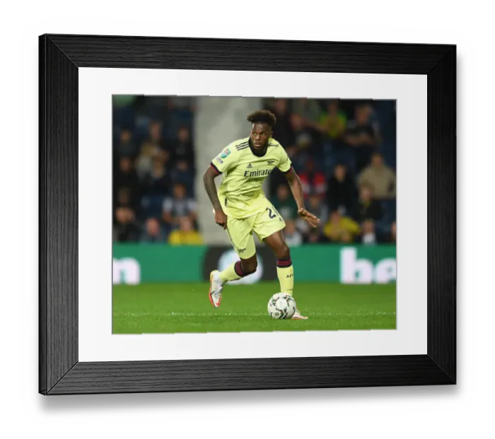 Framed Print : Nuno Tavares in Action: Arsenal's Defender Faces Off Against West Bromwich Albion in Carabao Cup Clash