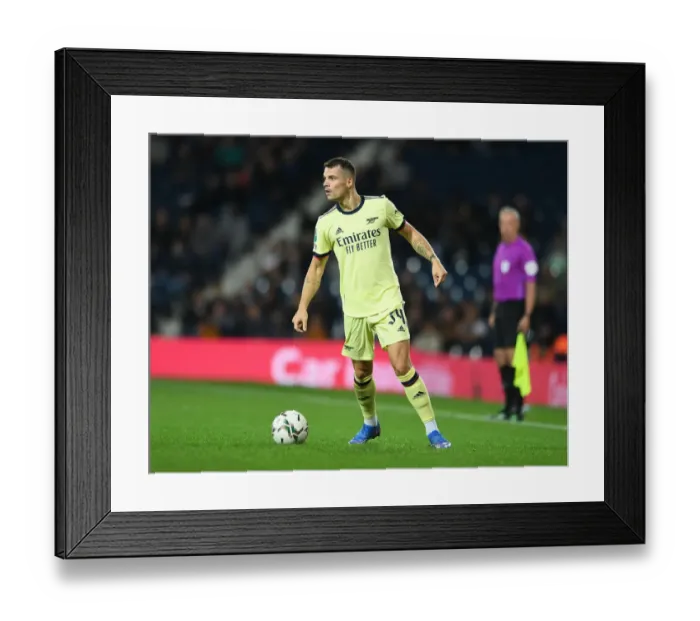 Framed Print : Granit Xhaka: Arsenal's Midfield Maestro Dazzles in Carabao Cup Showdown vs. West Bromwich Albion Framed Print : Granit Xhaka: Arsenal's Midfield Maestro Dazzles in Carabao Cup Showdown vs. West Bromwich Albion