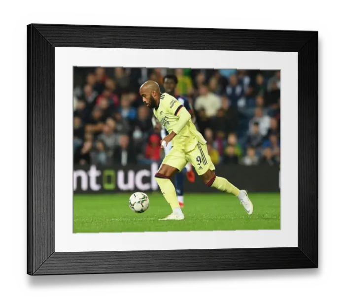Framed Print : Alexandre Lacazette's Brilliant Performance: Arsenal Overpowers West Bromwich Albion in Carabao Cup