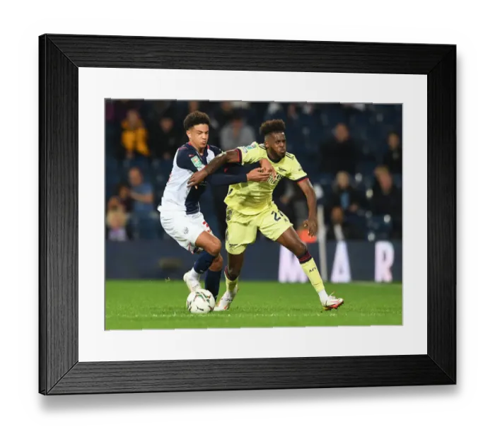 Framed Print : Clash of Defenders: Nuno Tavares vs Ethan Ebanks-Landell in the Carabao Cup Showdown Framed Print : Clash of Defenders: Nuno Tavares vs Ethan Ebanks-Landell in the Carabao Cup Showdown