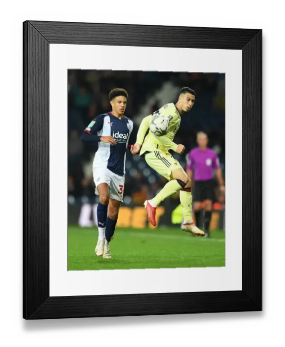 Framed Print : Gabriel Martinelli Faces Ethan Egan Pressure in Carabao Cup Clash: West Bromwich Albion vs Arsenal Framed Print : Gabriel Martinelli Faces Ethan Egan Pressure in Carabao Cup Clash: West Bromwich Albion vs Arsenal