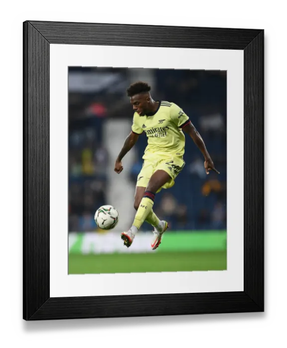 Framed Print : Nuno Tavares Faces Off: Arsenal's Defender in Carabao Cup Battle Against West Bromwich Albion