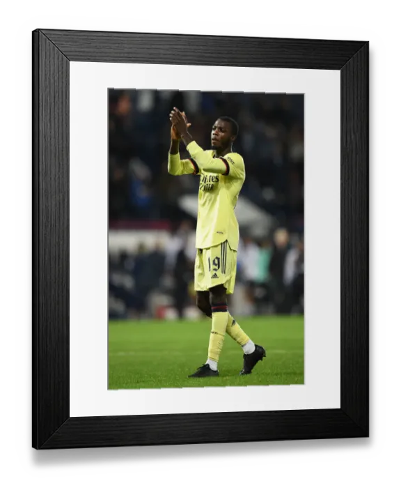 Framed Print : Arsenal's Nicolas Pepe Celebrates after Carabao Cup Victory over West Bromwich Albion