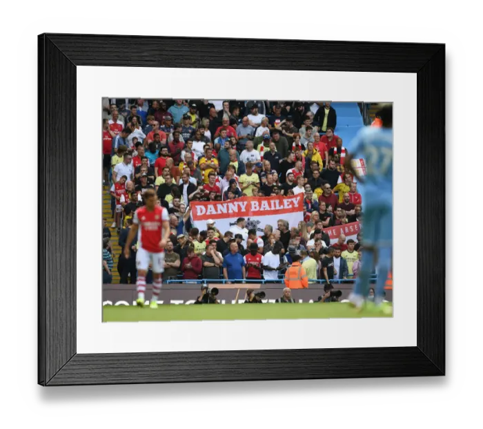 Framed Print : Arsenal Fans Honor Late Supporter Danny Bailey Before Manchester City Clash