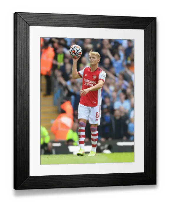 Framed Print : Arsenal's Martin Odegaard Faces Manchester City in Premier League Showdown Framed Print : Arsenal's Martin Odegaard Faces Manchester City in Premier League Showdown
