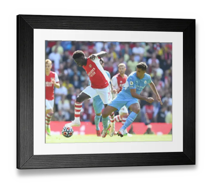 Framed Print : Bukayo Saka vs Joao Cancelo: Manchester City vs Arsenal, Premier League Showdown (2021-22)