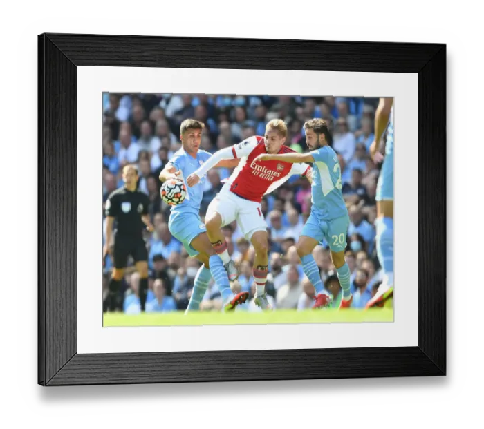 Framed Print : Manchester City vs Arsenal: Emile Smith Rowe Faces Off Against Rodri and Bernardo Silva Framed Print : Manchester City vs Arsenal: Emile Smith Rowe Faces Off Against Rodri and Bernardo Silva