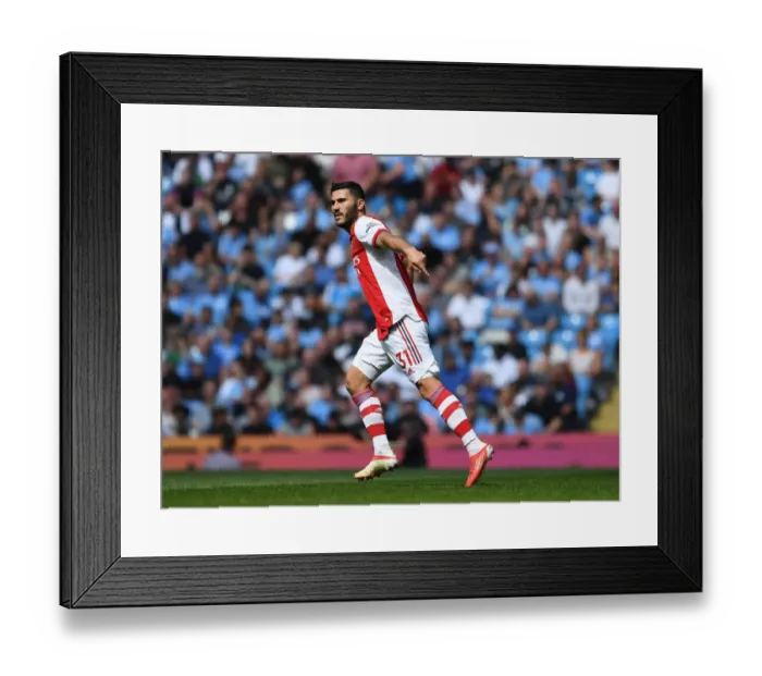 Framed Print : Arsenal's Sead Kolasinac Faces Off Against Manchester City in Premier League Showdown