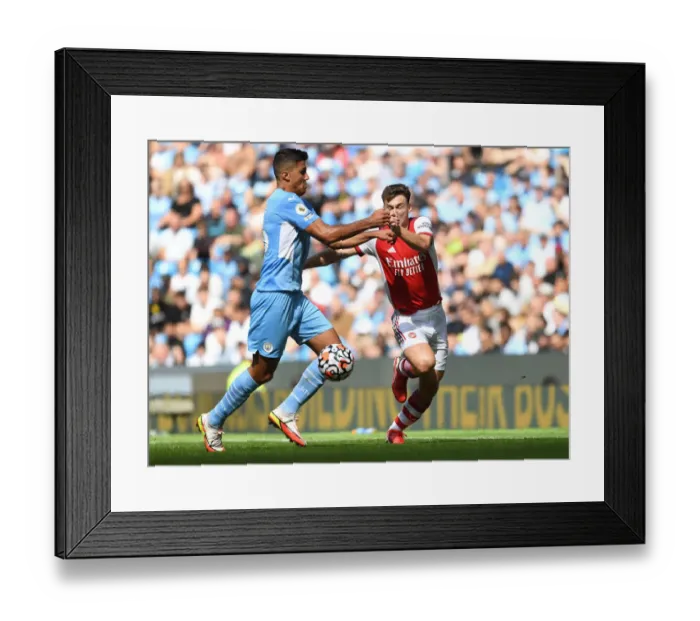 Framed Print : Manchester City vs Arsenal: Kieran Tierney Fouls Rodri in Premier League Clash (2021-22)