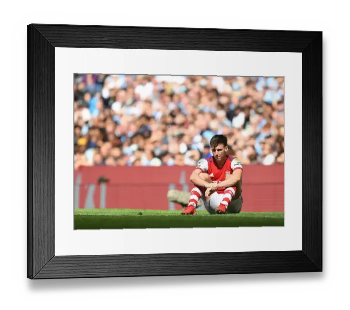 Framed Print : Arsenal's Kieran Tierney Faces Off Against Manchester City in Premier League Showdown