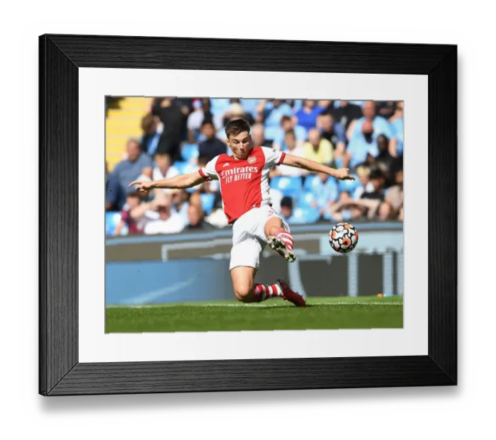 Framed Print : Arsenal's Kieran Tierney Goes Head-to-Head with Manchester City in Premier League Battle