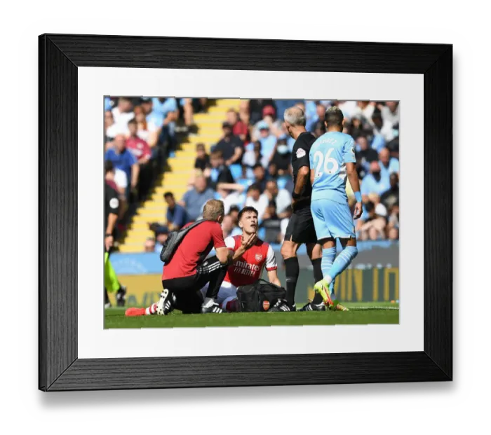 Framed Print : Arsenal's Kieran Tierney Protests to Referee during Manchester City Clash - Premier League 2021-22