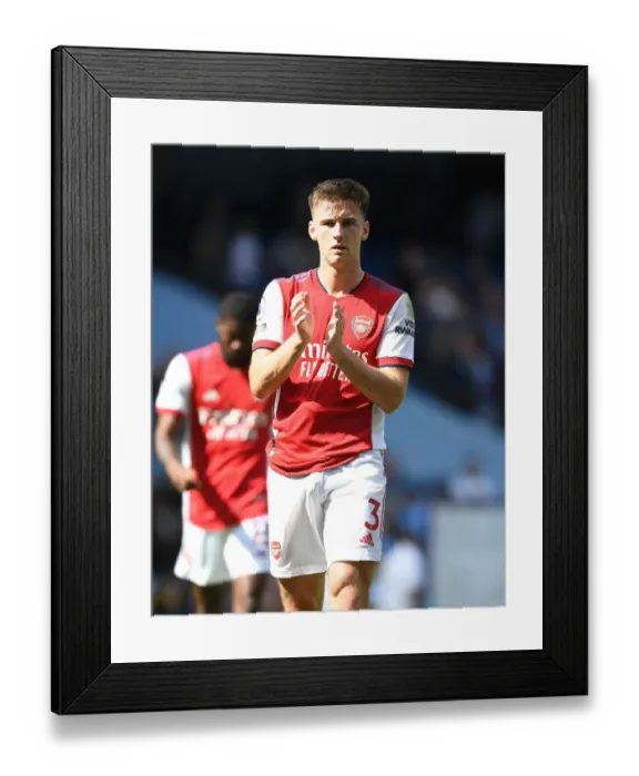 Framed Print : Arsenal's Kieran Tierney Applauding Fans after Manchester City Showdown - Premier League 2021-22