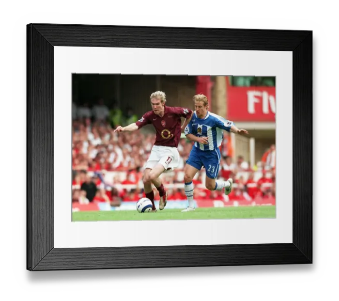 Framed Print : Alex Hleb (Arsenal) Reto Ziegler (Wigan). Arsenal 4: 2 Wigan Athletic
